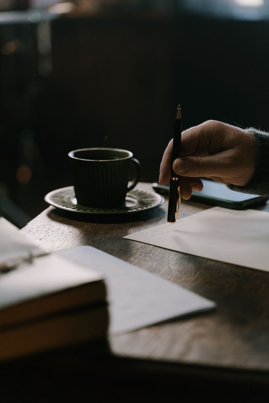 a person holding a pen